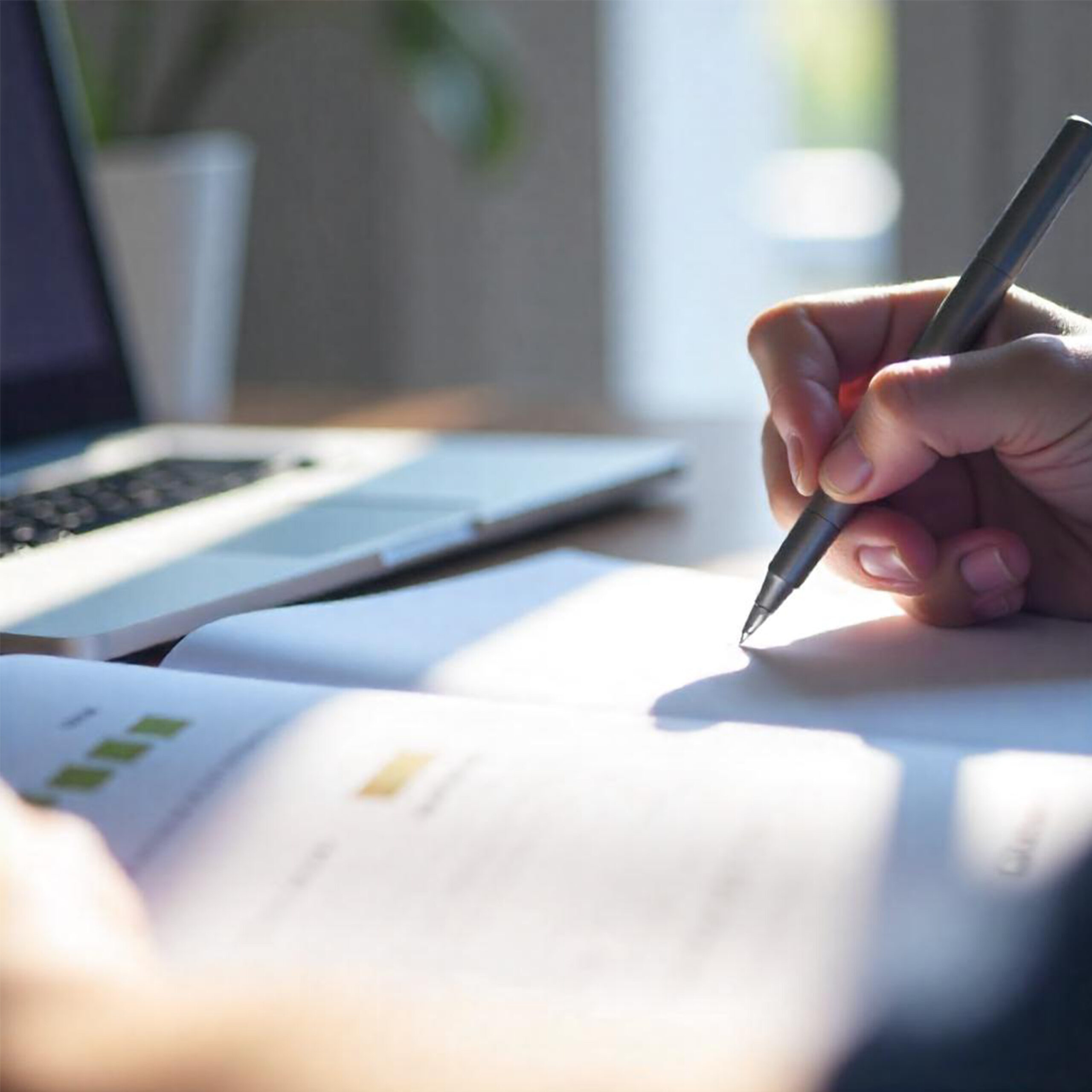 hand-is-writing-piece-paper-with-word-it